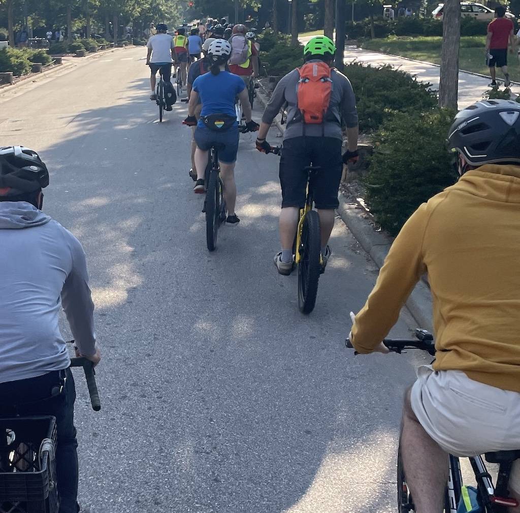Cyclists riding on UNC campus