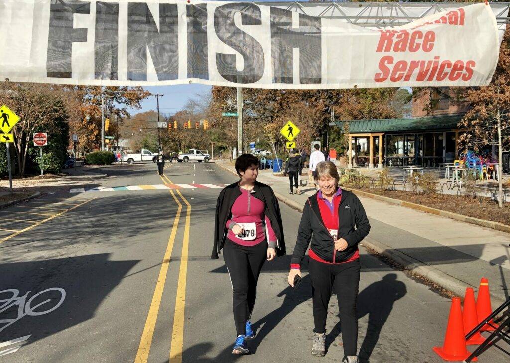 Two runners finish a running race