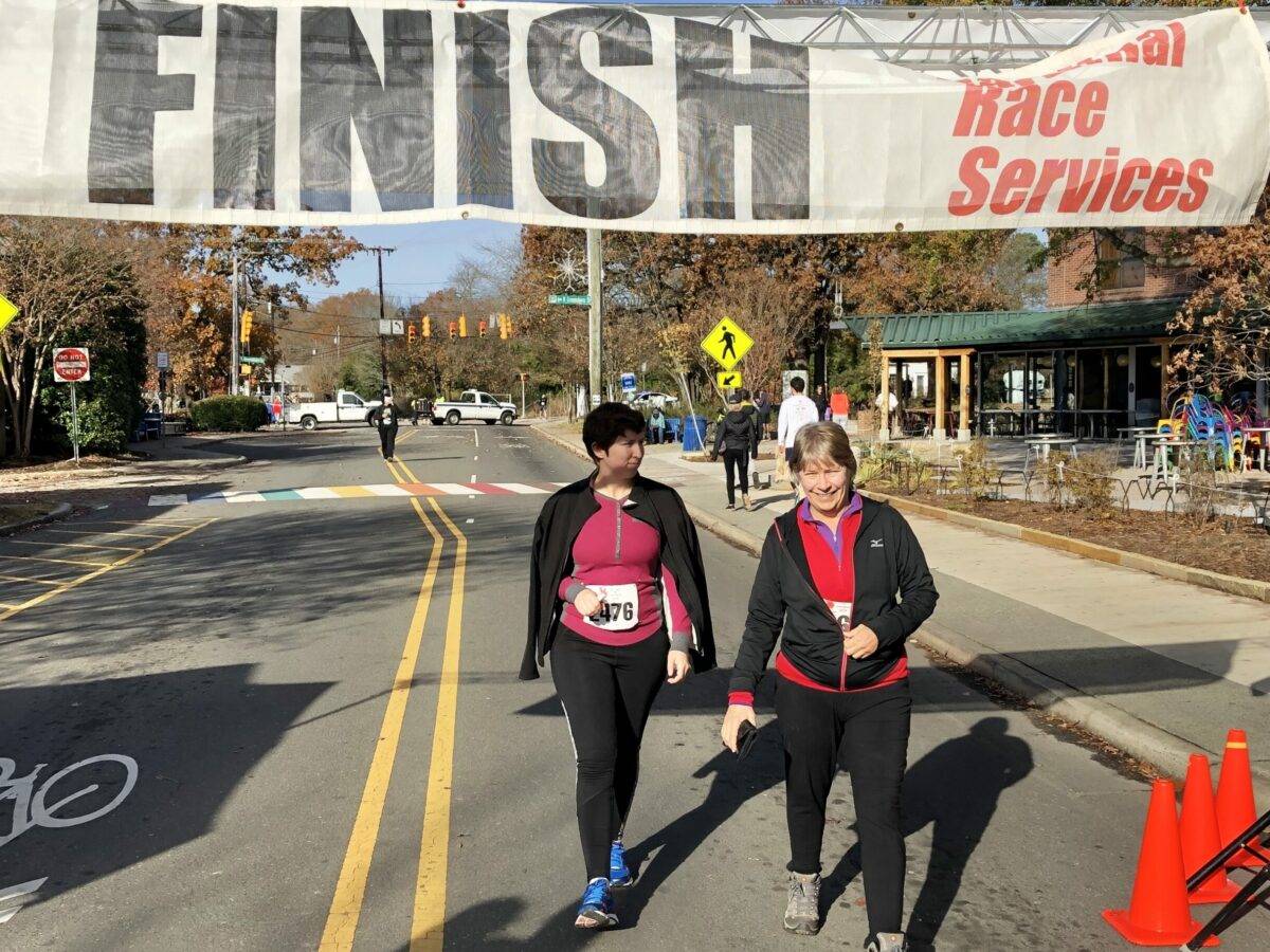 Two runners finish a running race