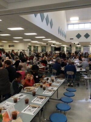 Attend the Community Dinner on April 28 at McDougle Middle School