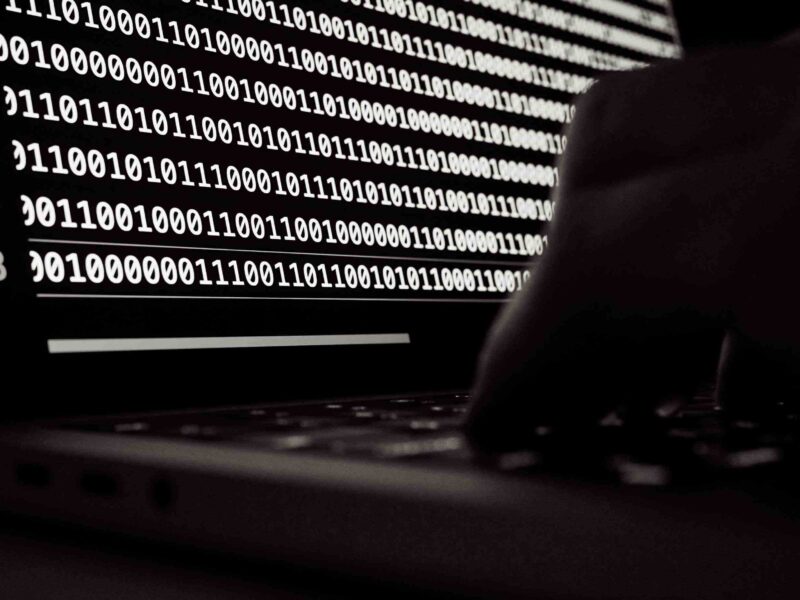 A computer hacking hacking into a network.