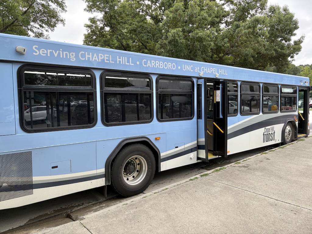 A Chapel Hill transit waits for passengers to board