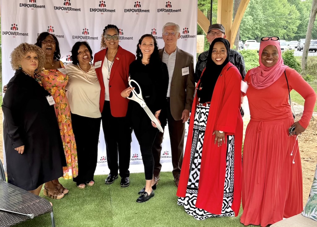 Officers of EMPOWERment Inc and local elected and dignitaries at the ribbon cutting