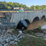 trash bin in creek
