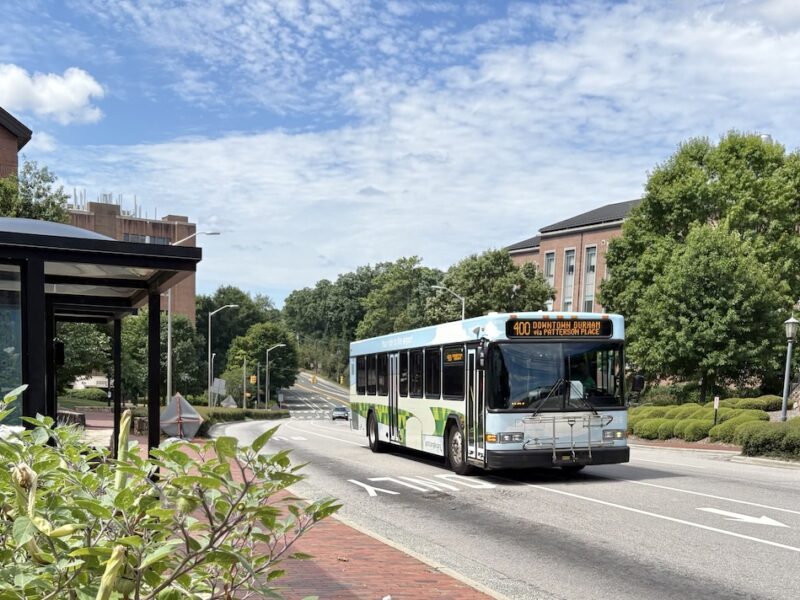 The GoTriangle 400 bus passes a stop at the Health Science Library on UNC Campus in Chapel Hill