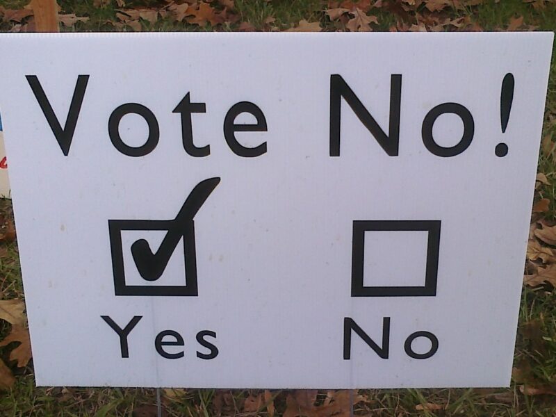 A ambiguous sign that suggest voting no, but has the yes box checked