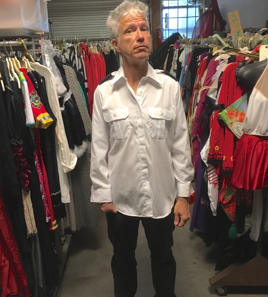 A man wearing a military dress shirt