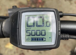 Photograph of a bike odometer that reflects 5,000 miles of riding