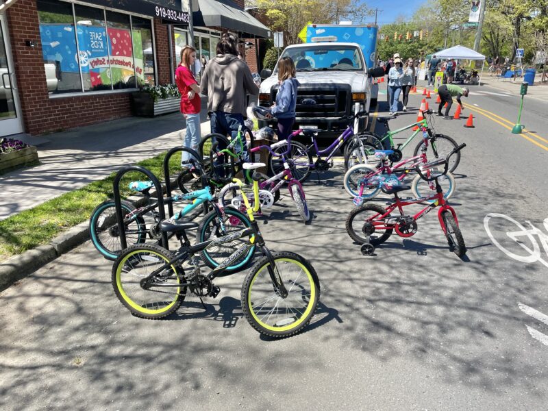 Children bikes lined up on Weaver Street