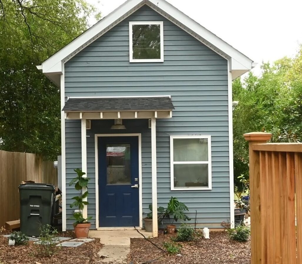 Coram Houses "The Gerard" design. 192 square-foot tiny studio with one loft bedroom and one bathroom.