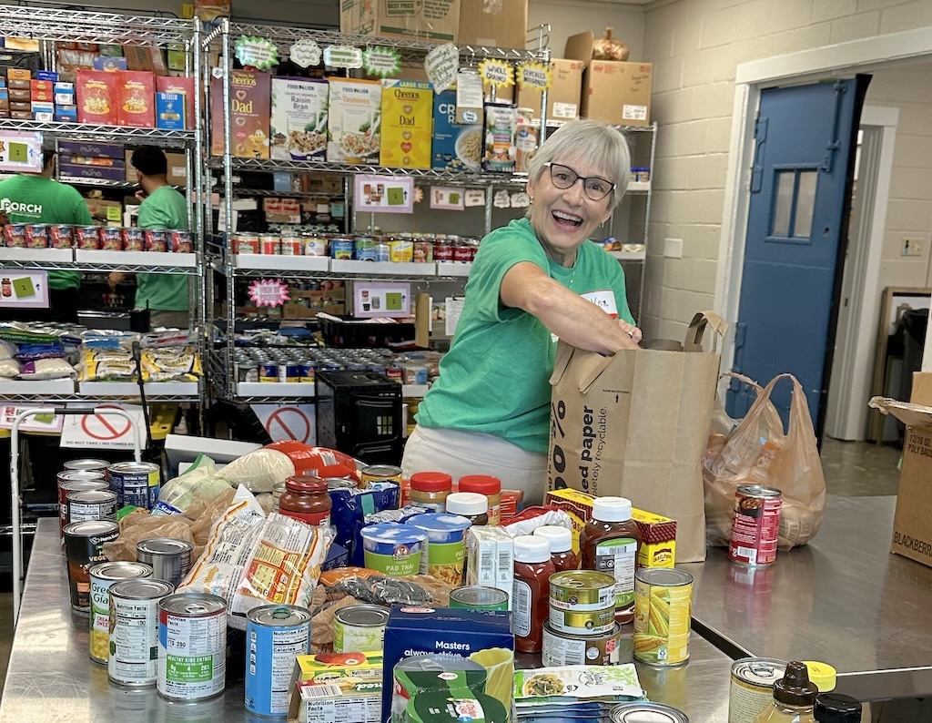 A PORCH Chapel Hill-Carrboro volunteer sorts non-perishable donations.
